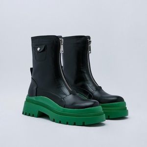 Black and green contrast combat boot